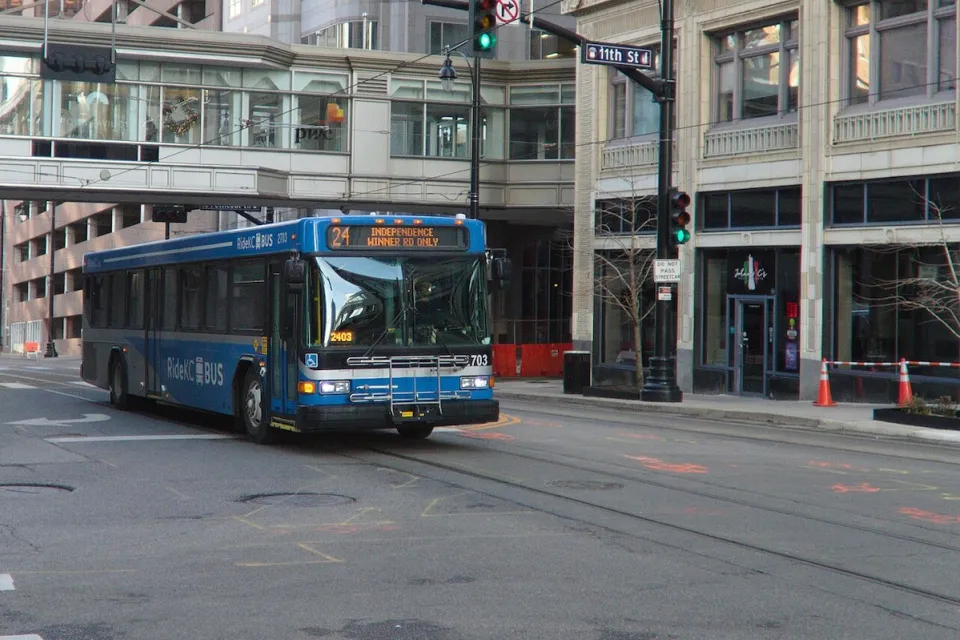 Blue Kansas City transit bus on Main Street, Kansas City, Missouri.